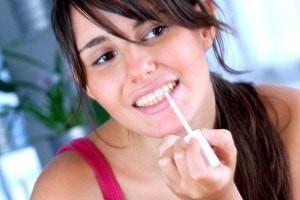 home teeth whitening kit: bleaching gel is applied with a brush